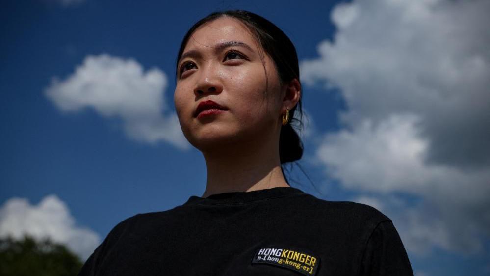 Hong Kong police arrest family of pro-democracy activist, reports say Hong Kong police arrest family of pro-democracy activist, reports say